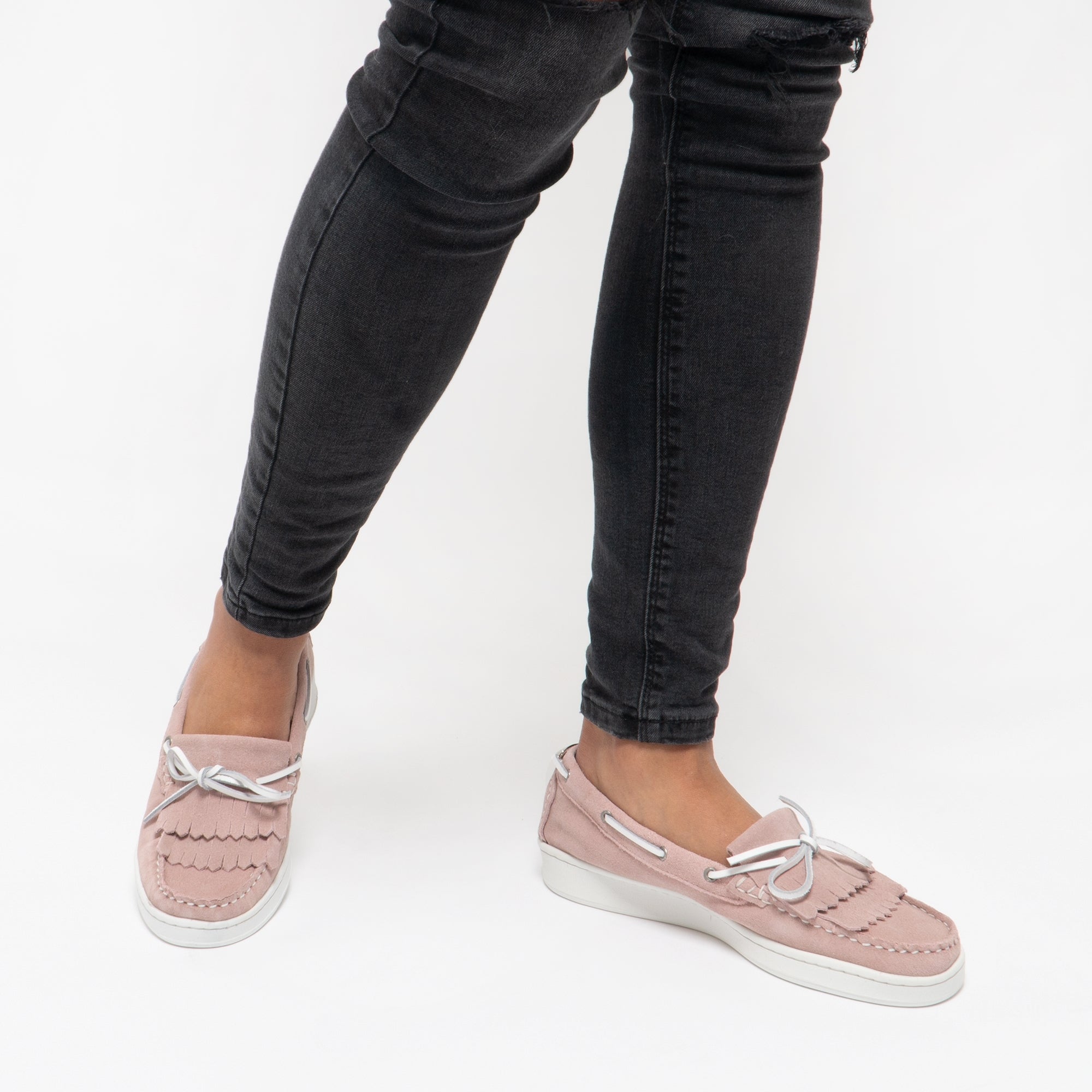 Barbour KLARA Womens Suede Fringe Loafers Pink side view worn with black skinny jeans