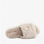 Bedroom Athletics RUBY Womens Faux Fur Slide Slippers Cream side view with soft plush upper and decorative bow.