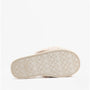 Bedroom Athletics RUBY Womens Faux Fur Slide Slippers Cream bottom view, showcasing synthetic sole with patterned design.