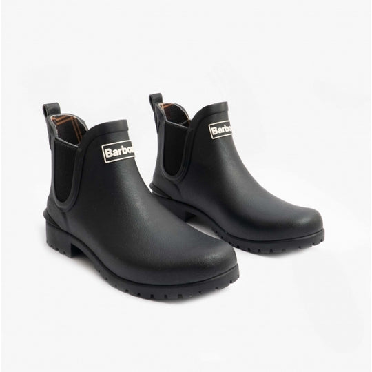 Barbour WILTON Womens Chelsea Wellington Boots Black side view showcasing pull-on design and flat heel.