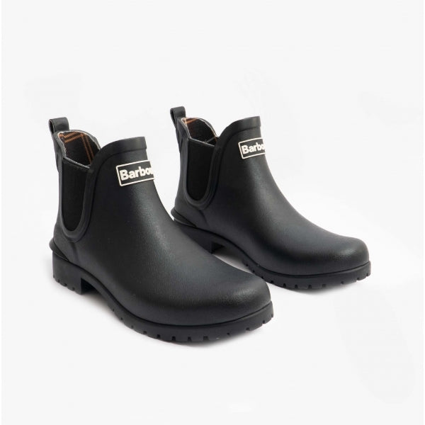 Barbour WILTON Womens Chelsea Wellington Boots Black side view showcasing pull-on design and flat heel.
