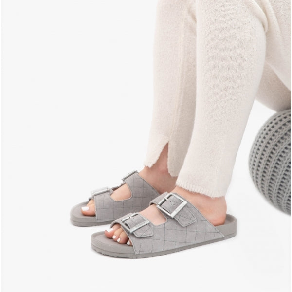 Barbour ELLIS Womens Suede Mule Slippers Grey side view worn with light-colored knit pants.
