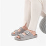 Barbour ELLIS Womens Suede Mule Slippers Grey side view worn with light-colored knit pants.