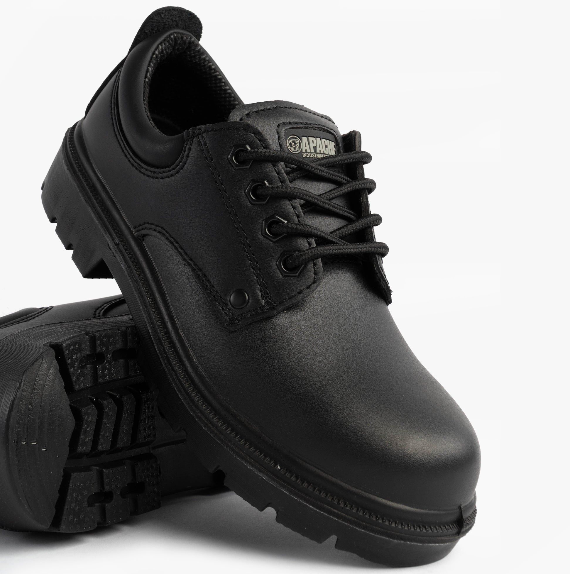 Apache AP306 Unisex Shoes Black side view with leather upper and rubber sole, featuring lace-up closure.