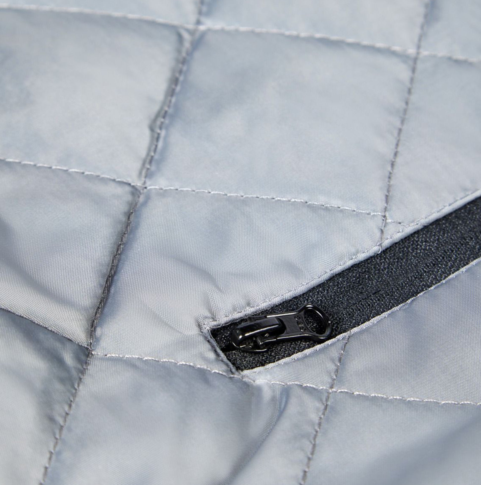 Apache ATS Mens Waterproof Coat Black detail view showing quilted fabric and zipper.