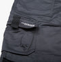 Detail view of Apache ATS Mens Trousers Grey showing pockets and label.