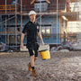 Apache LANGLEY Mens Polo Shirt Black Grey detail view worn by a construction worker at a building site.