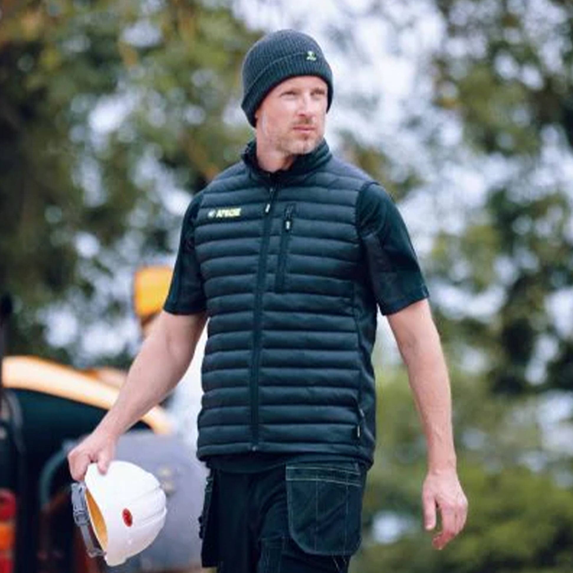 Apache PICTON Mens Gilet Black front view worn by man outdoors with a hard hat.