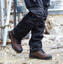 Apache RANGER Unisex Boots Brown side view worn in puddle, showcasing comfort and water resistance features.