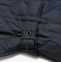 Barbour QUILTED DOG COAT Navy detail view showcasing buckle closure and adjustable strap.