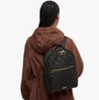 Barbour QUILTED Womens Backpack Olive back view, featuring zip closure and quilted design, worn with a brown jacket.