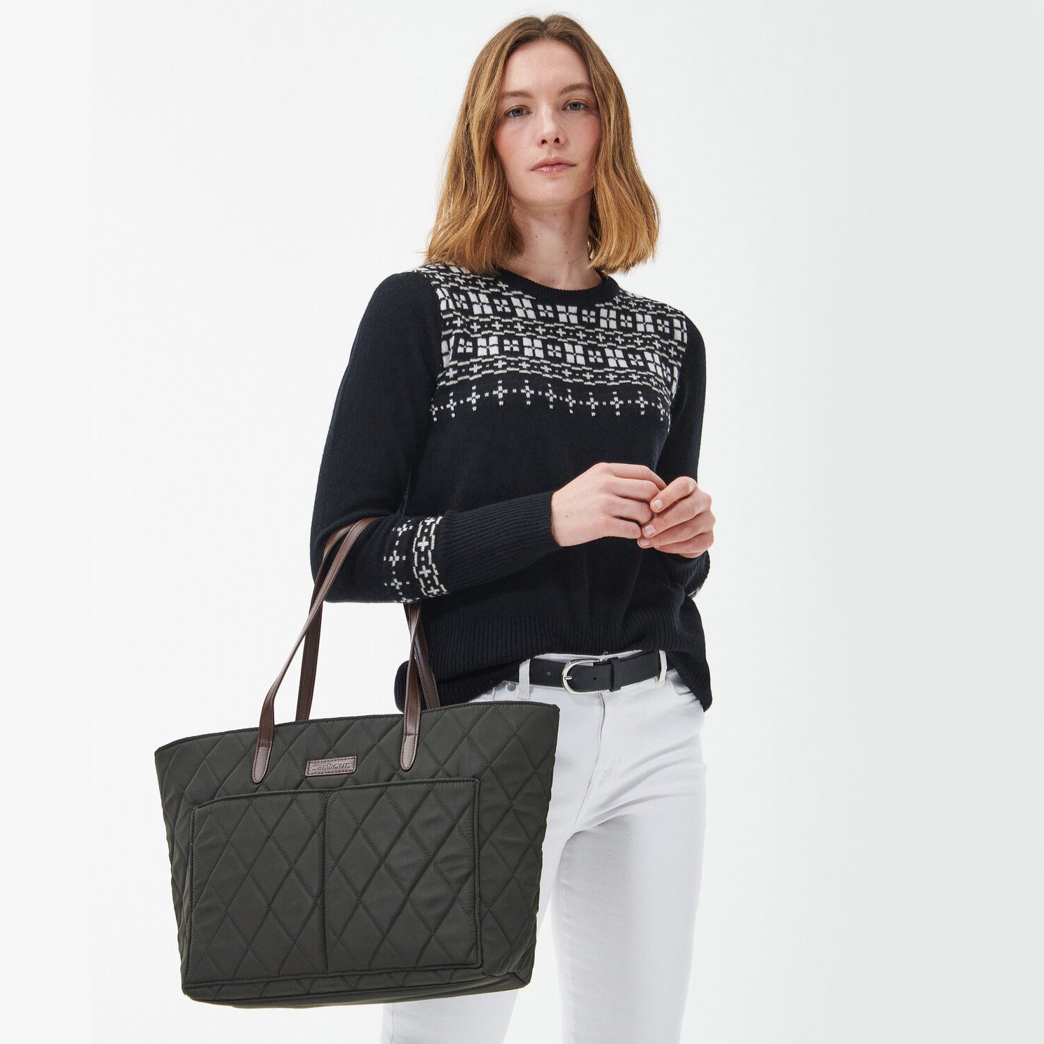 Barbour QUILTED Womens Tote Bag Olive front view with model, showcasing leather-look handles and quilted design.