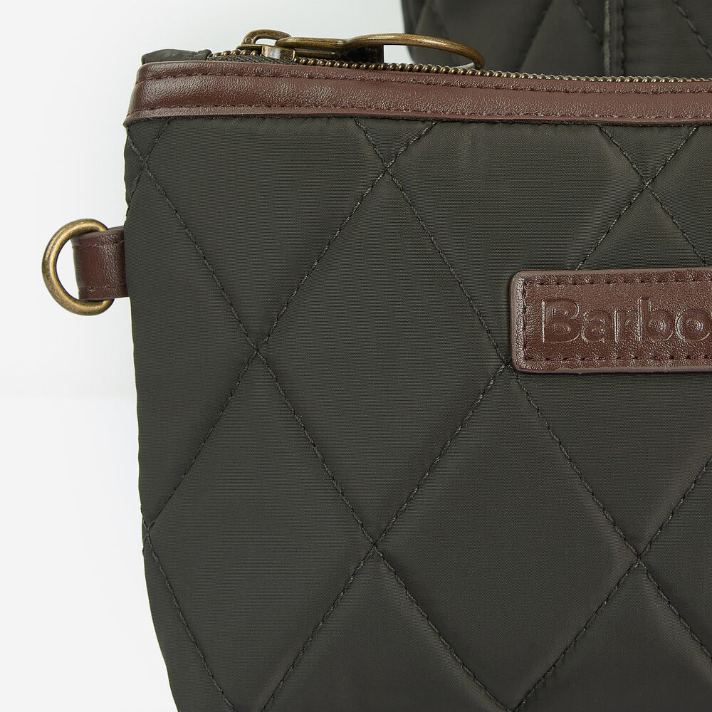 Detail view of Barbour QUILTED Womens Tote Bag Olive showcasing the quilted texture and leather-look handle.