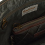 Detail view of Barbour QUILTED Womens Tote Bag Olive interior, showing zippered pockets and fabric lining.