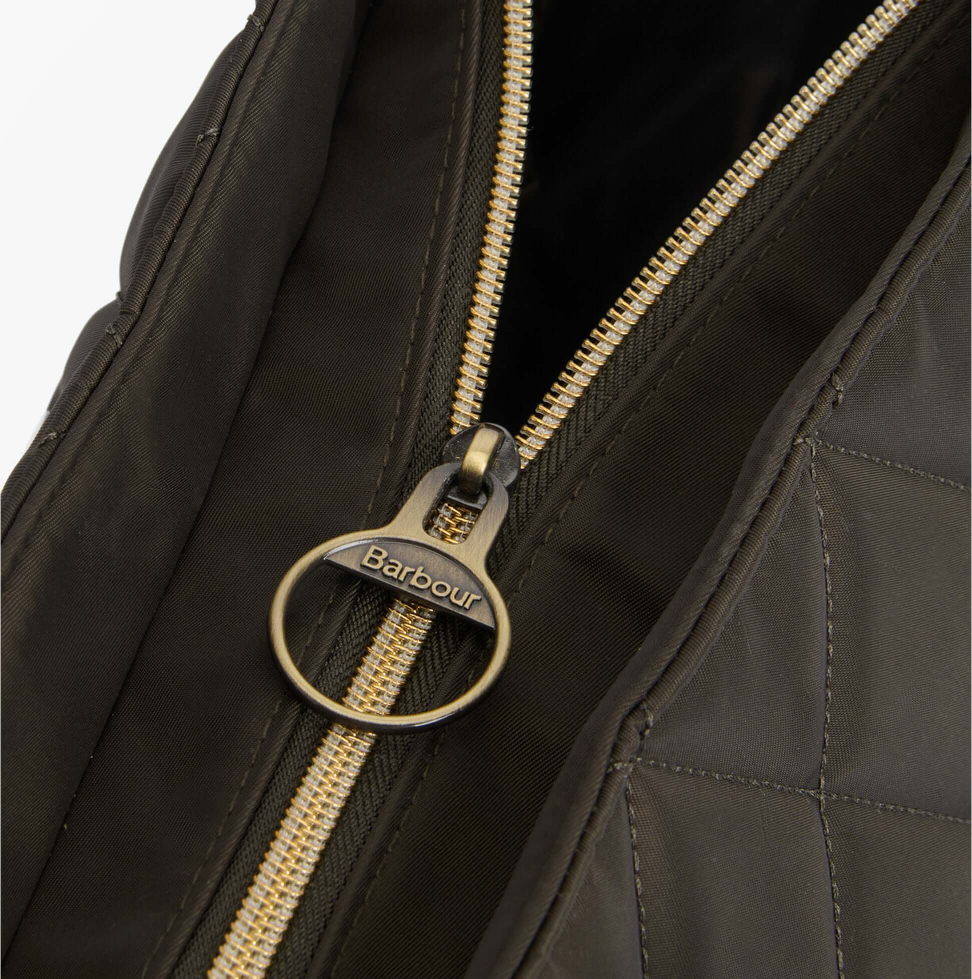 Barbour QUILTED Womens Tote Bag & Purse Olive detail view of zip closure showing Barbour zipper pull