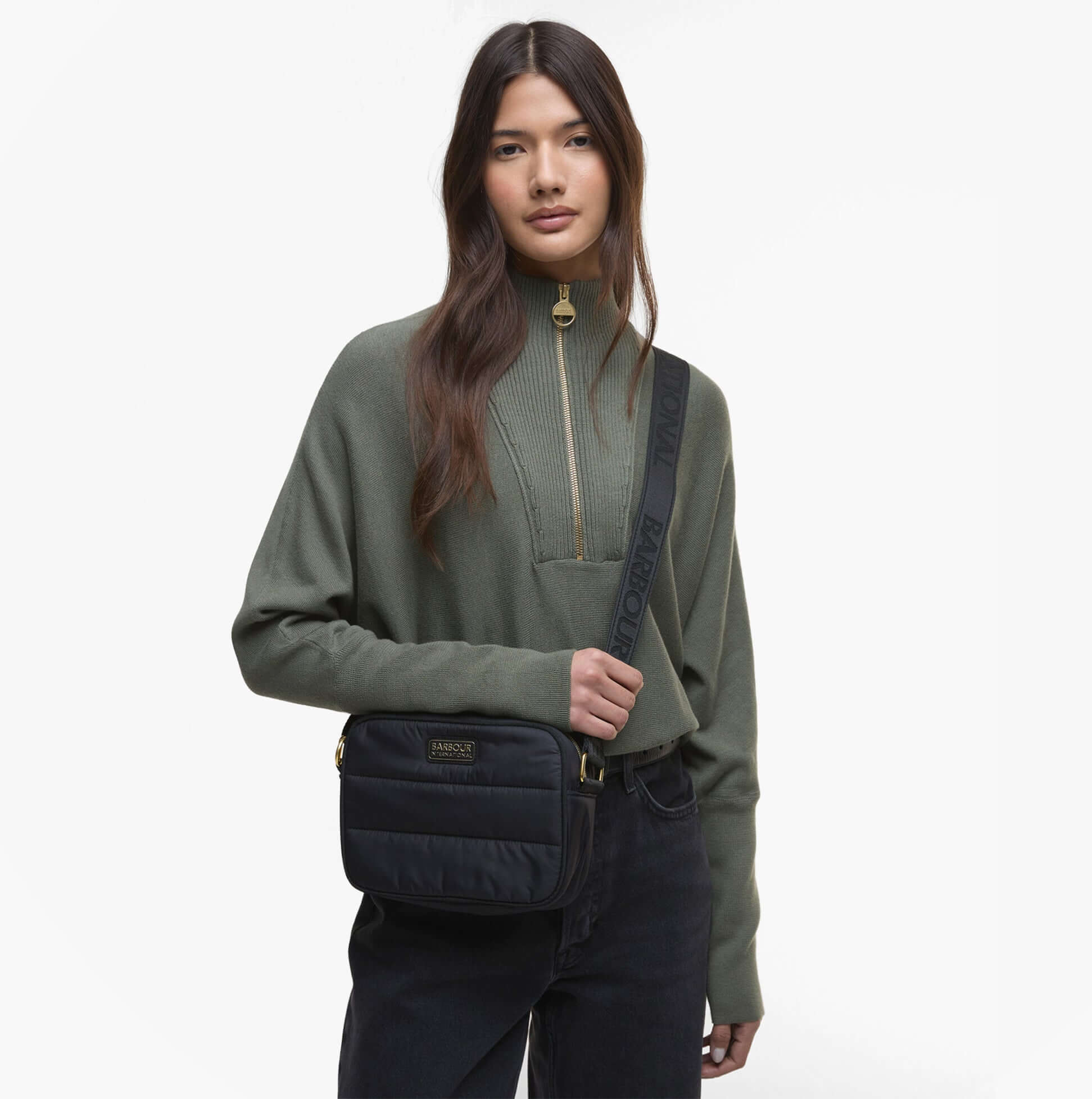 Barbour MONACO QUILT Womens Crossbody Bag Black front view with model wearing sweater and bag over shoulder.