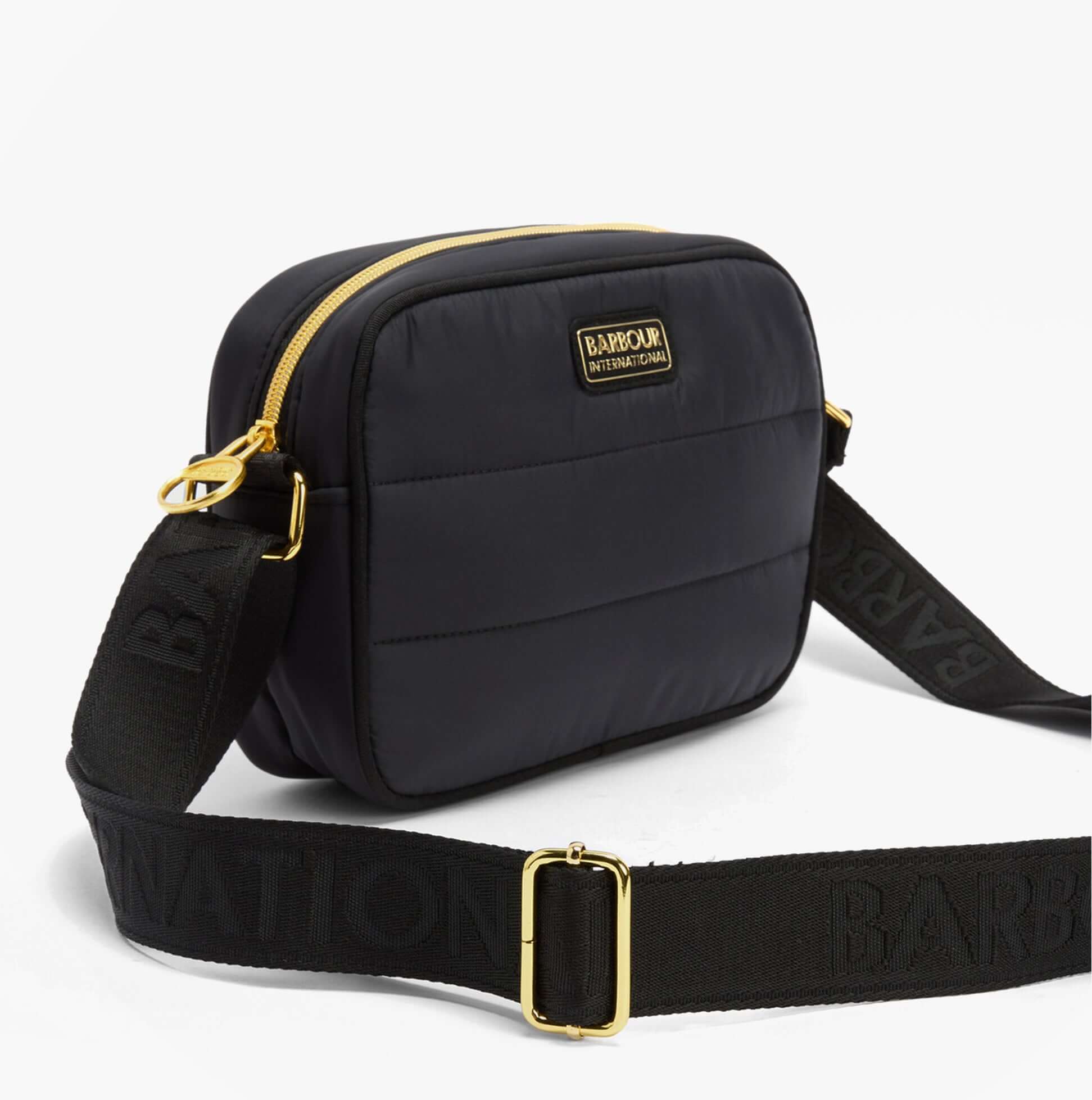 Barbour MONACO QUILT Womens Crossbody Bag Black side view with zip closure and adjustable strap.