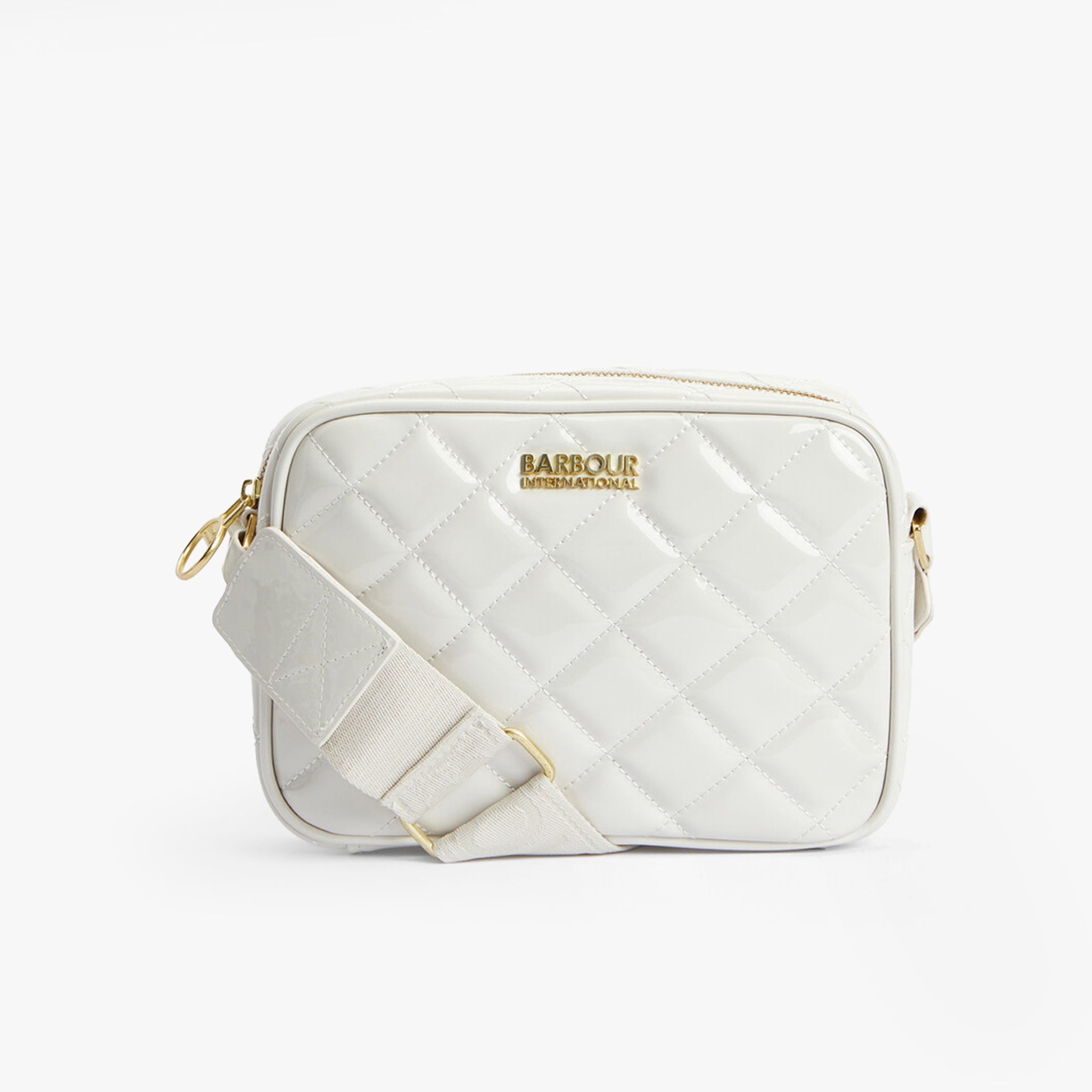 Barbour B.INTL QUILTED SLOANE Womens Crossbody Bag Gloss Silver Birch front view with adjustable strap and logo.
