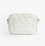 Barbour B.INTL QUILTED SLOANE Womens Crossbody Bag Gloss Silver Birch front view with zip closure and quilted design