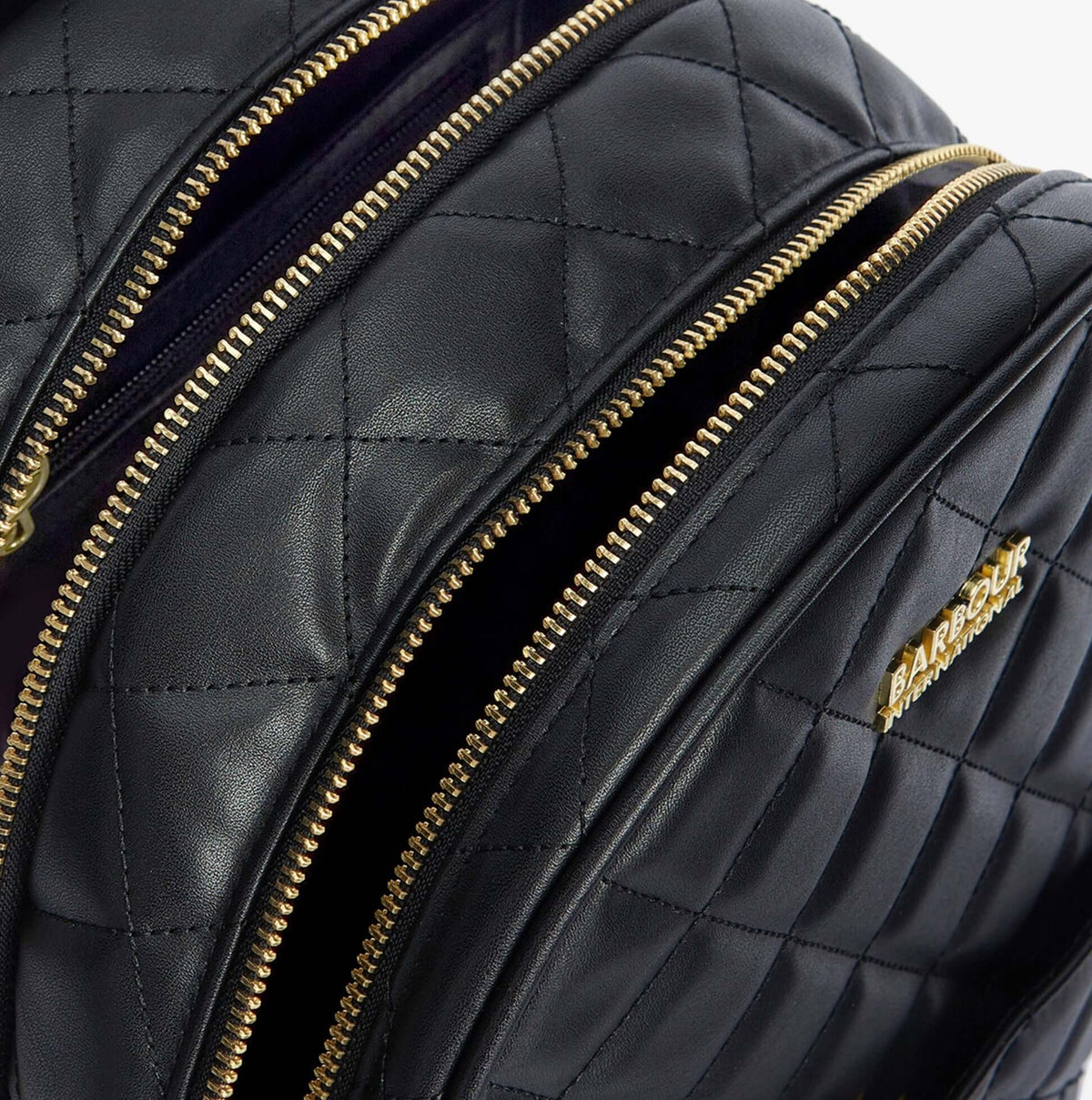 Barbour QUILTED UXBRIDGE Womens Backpack Black detail view with zippers and quilted texture.