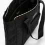Barbour B.INTL QUALIFY Womens Tote Bag Black, top view showing zip closure and interior lining.
