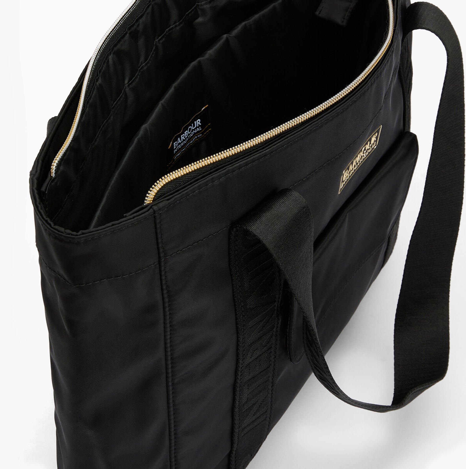 Barbour B.INTL QUALIFY Womens Tote Bag Black, top view showing zip closure and interior lining.
