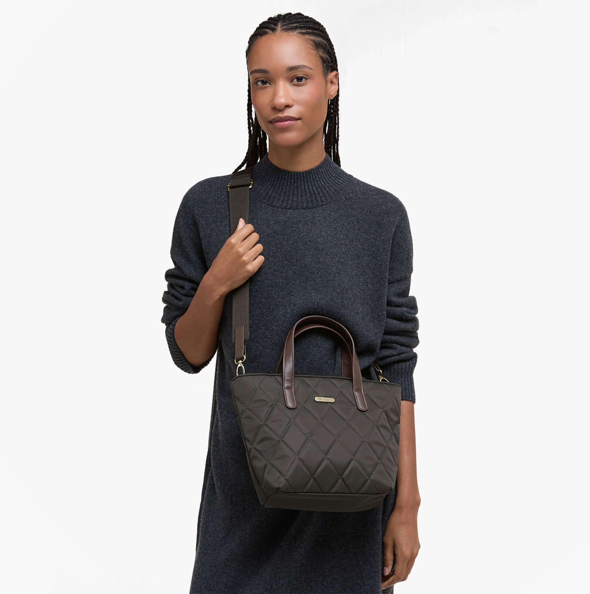 Barbour MINI QUILTED Womens Tote Bag Olive side view, model wearing it with sweater, showcasing design and color.