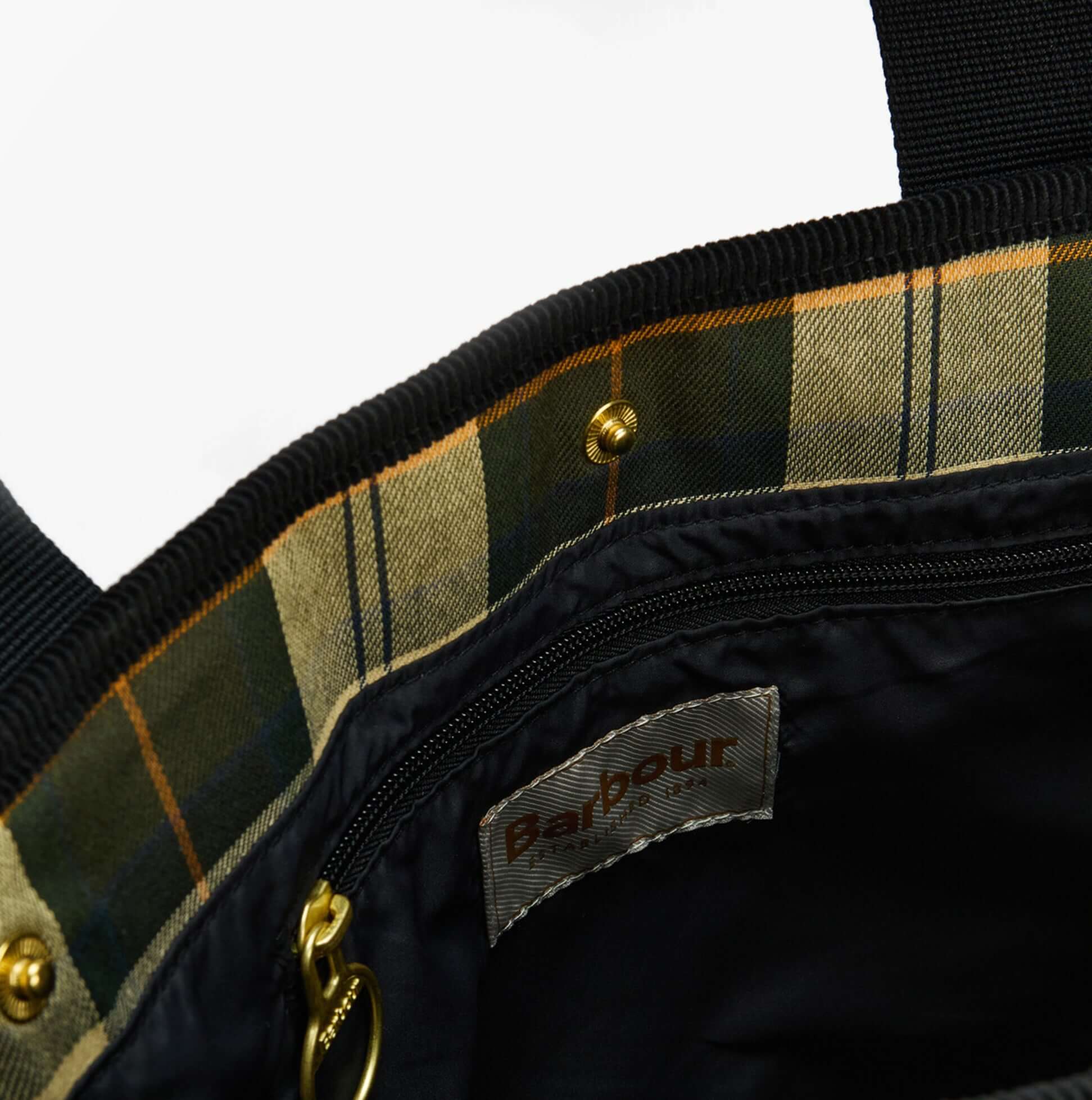 Barbour HEALY Tote Bag Womens Tote Bag Black/Ancient detail view of bag interior showcasing plaid lining and logo tag.