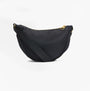 Barbour QUALIFY Womens Sling Bag Black side view with zip closure and adjustable strap.