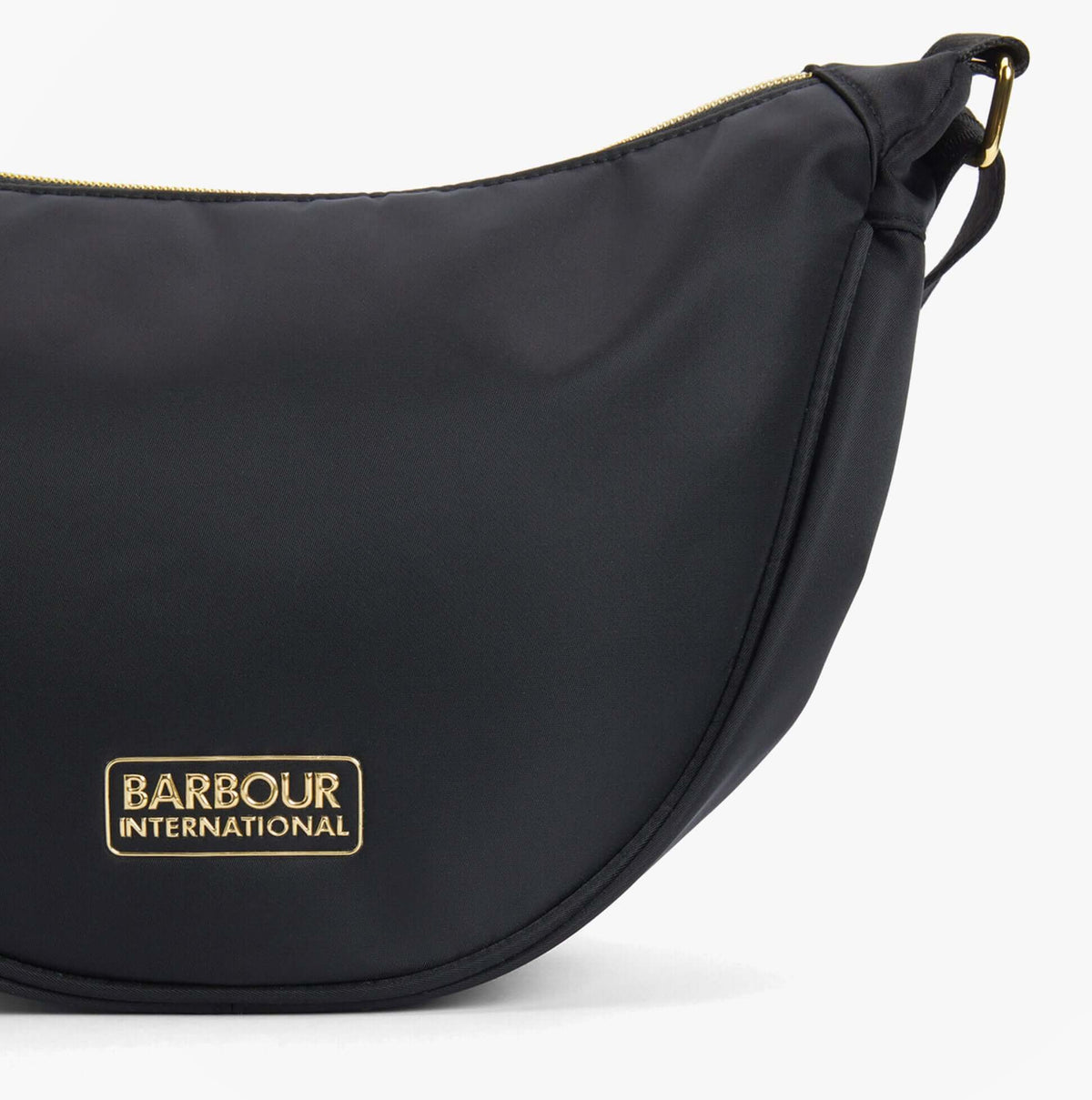 Barbour QUALIFY Womens Sling Bag Black side view with gold logo detail on black nylon material.
