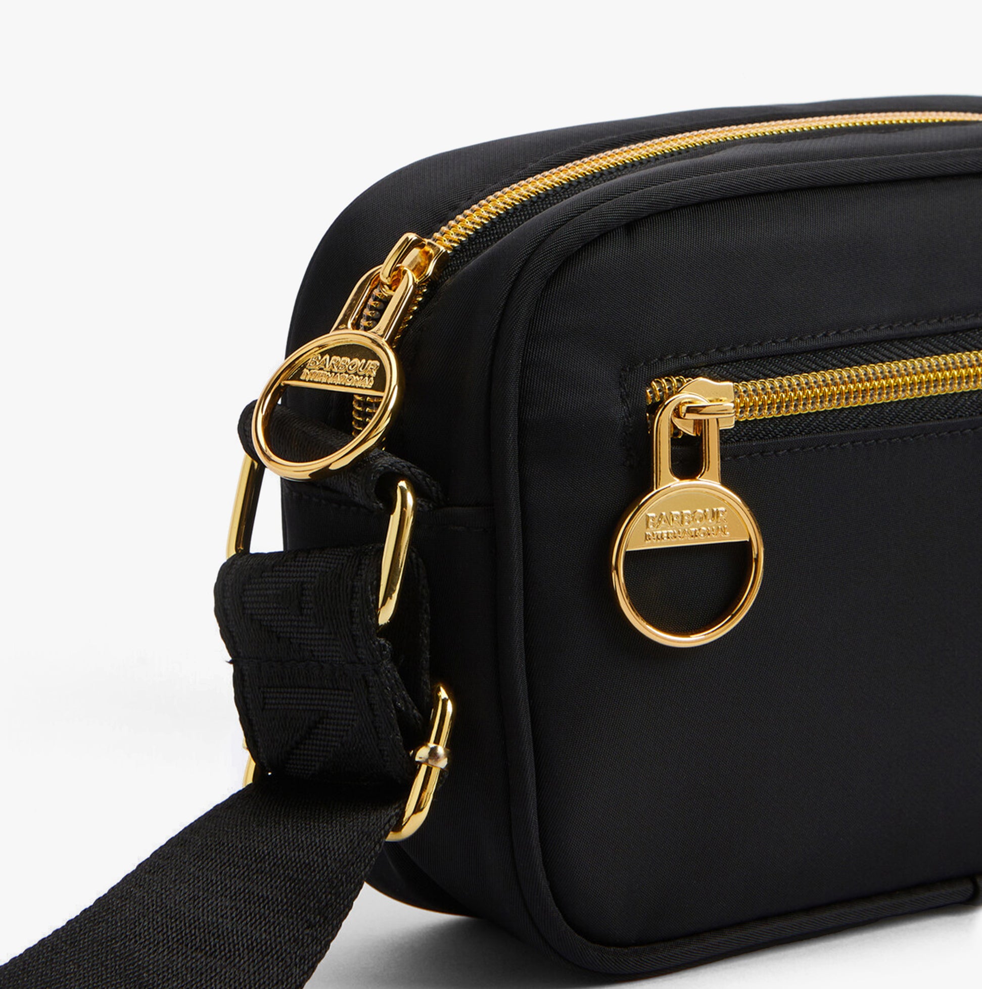 Barbour B.INTL MICRO QUALIFY Womens Crossbody Bag Black side view with gold zip and strap detail