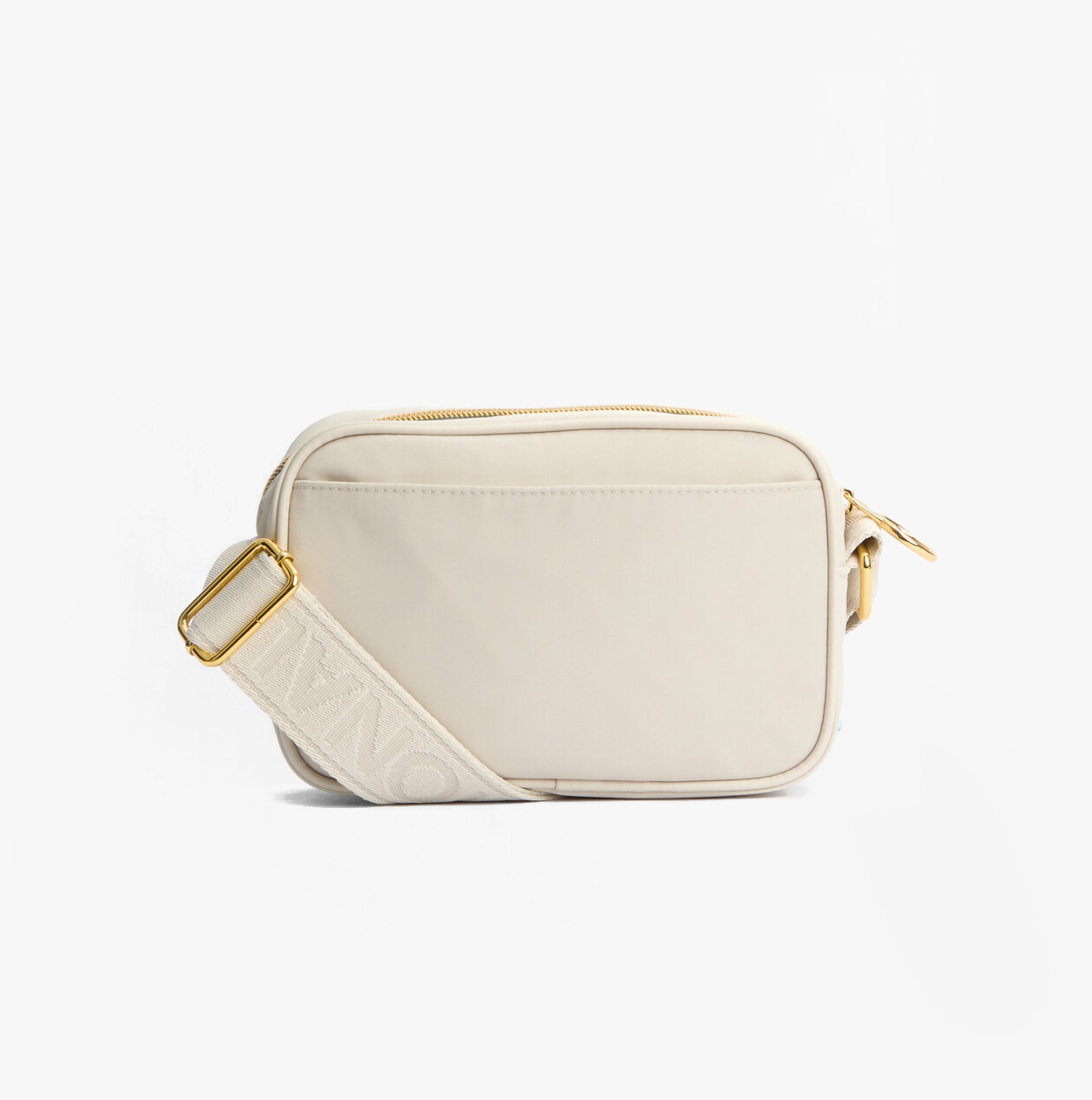 Barbour B.INTL MICRO QUALIFY Womens Crossbody Bag Light Pearl side view showcasing adjustable strap and zip closure.