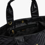 Barbour B.INTL BATTERSEA QUILTED Womens Mini Tote Bag Black interior view showing zip pocket and lining details.