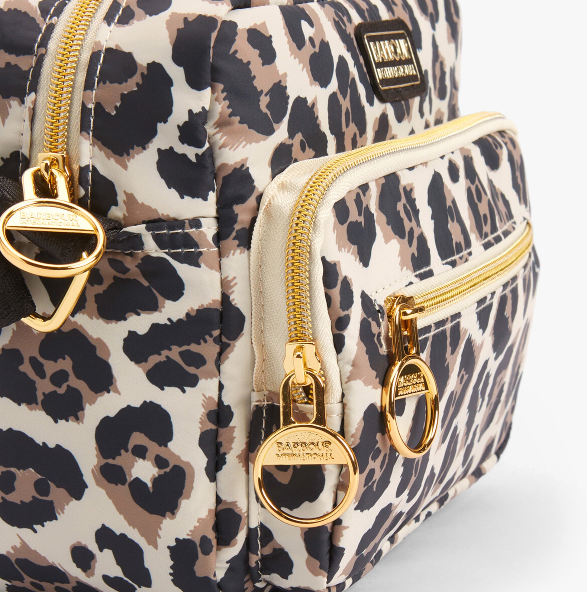 Barbour B.INTL BOULEVARD Womens Crossbody Bag Pearl Jaguar detail view featuring gold zip pulls and leopard print design
