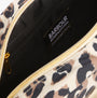 Barbour B.INTL BOULEVARD Womens Crossbody Bag Pearl Jaguar interior view with branded tag and zip closure.