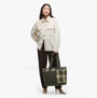Barbour MYA PATCHWORK Tote Bag Womens Tote Bag Sage/Ancient held by model in front view, showcasing patchwork design and colors.