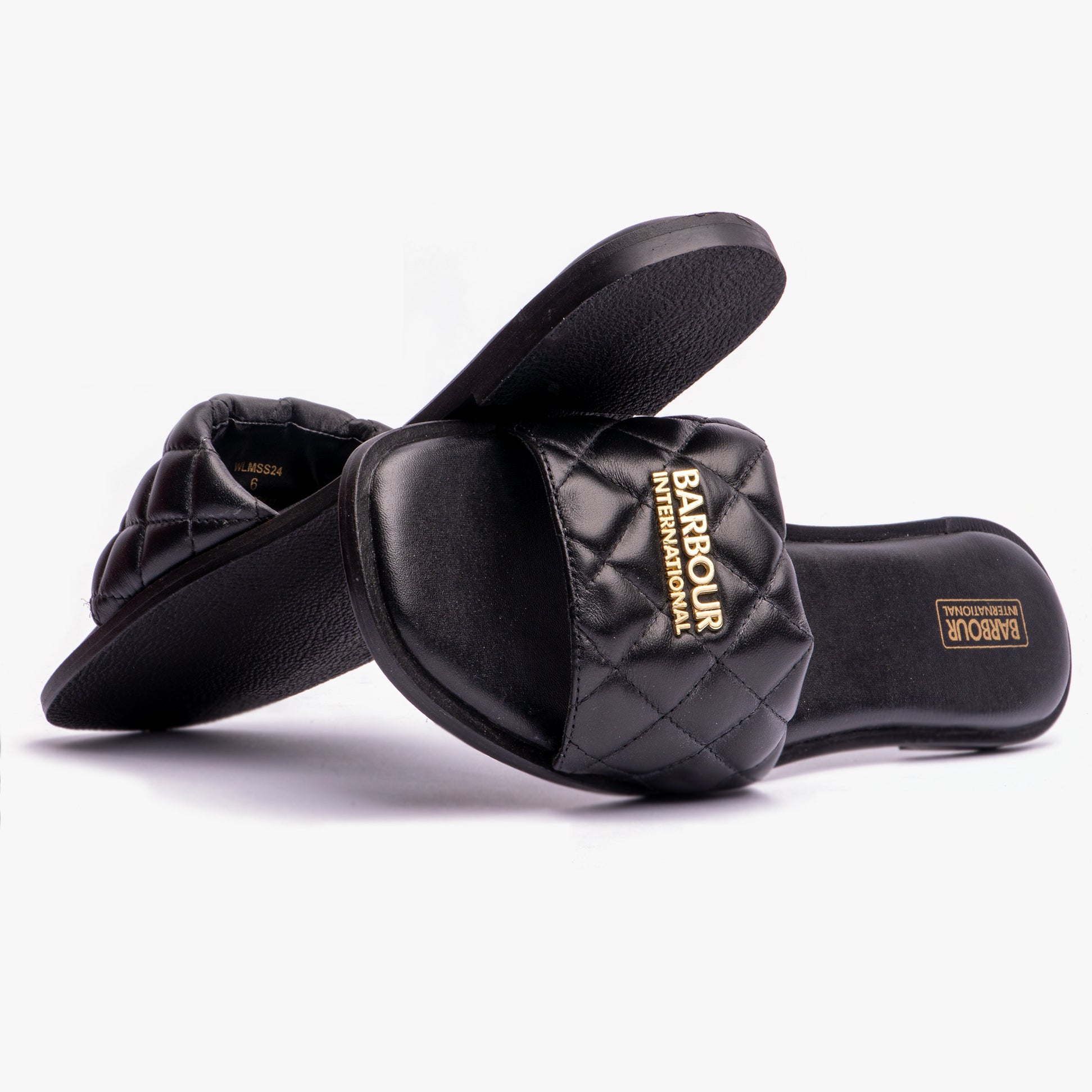 Barbour KINGHORN Womens Sandals Black side view with quilted upper and slip-on design, showcasing the lightweight and flat sole.