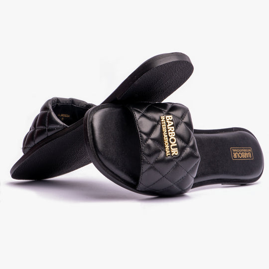 Barbour KINGHORN Womens Sandals Black side view with quilted upper and slip-on design, showcasing the lightweight and flat sole.