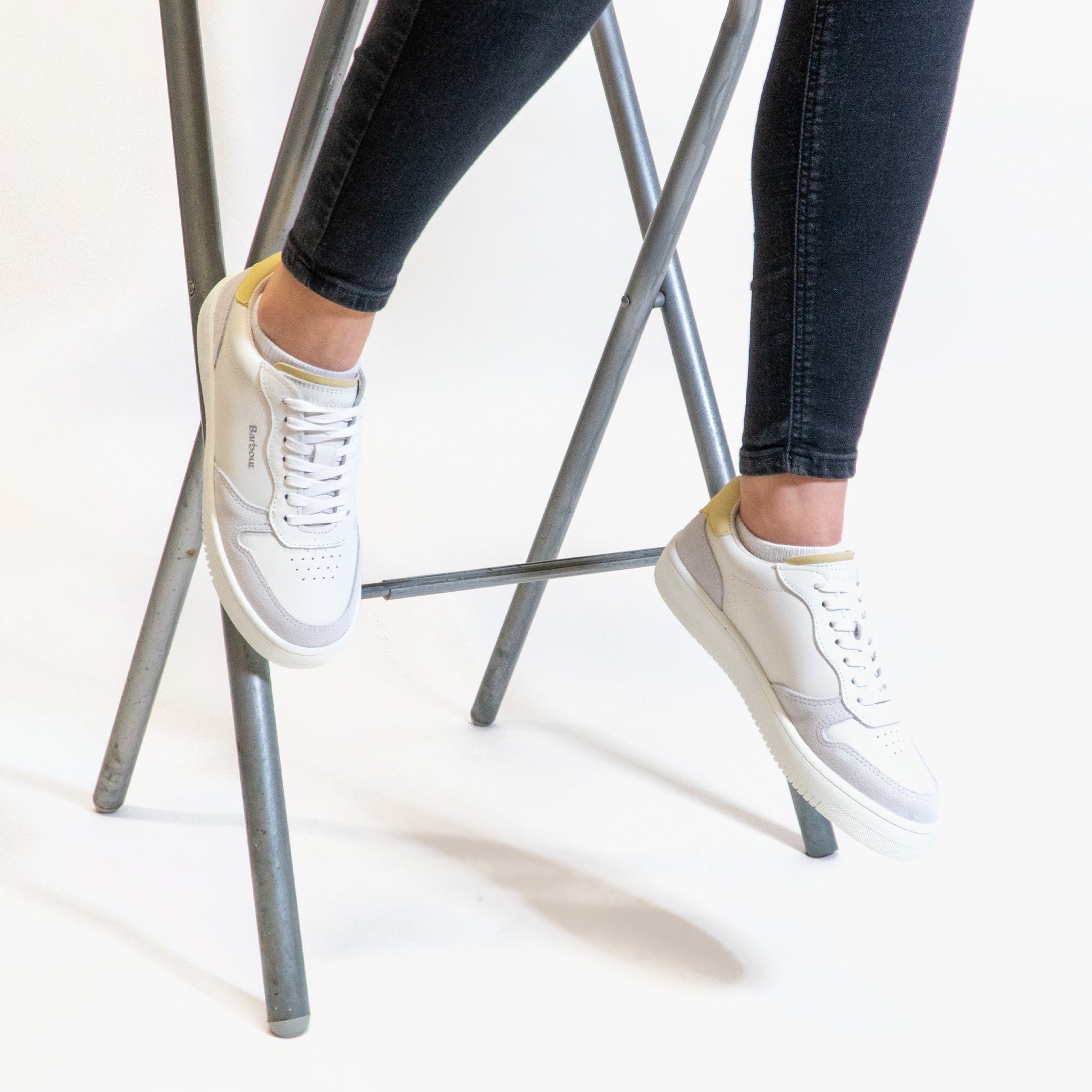 Barbour CELESTE Womens Casual Trainers White/Lemonade side view on feet showing a casual stylish look.