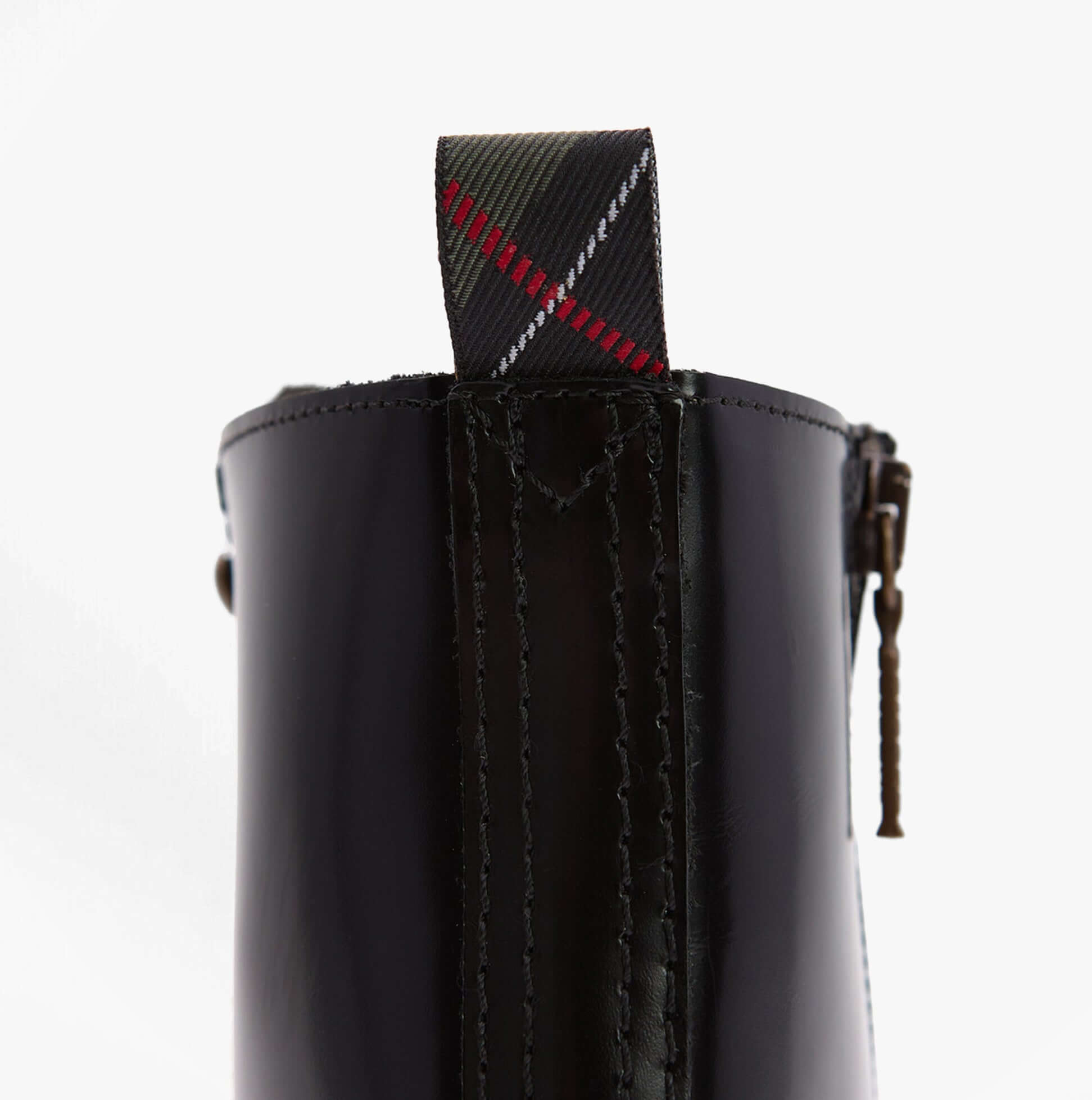 Barbour OUSEBURNE Womens Lace Up Boots Black Glace detail view of heel pull tab with plaid design