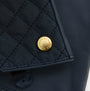 Barbour SCARLET Womens Touchscreen Gloves Navy detail view showcasing gold branded rivet on quilted leather.