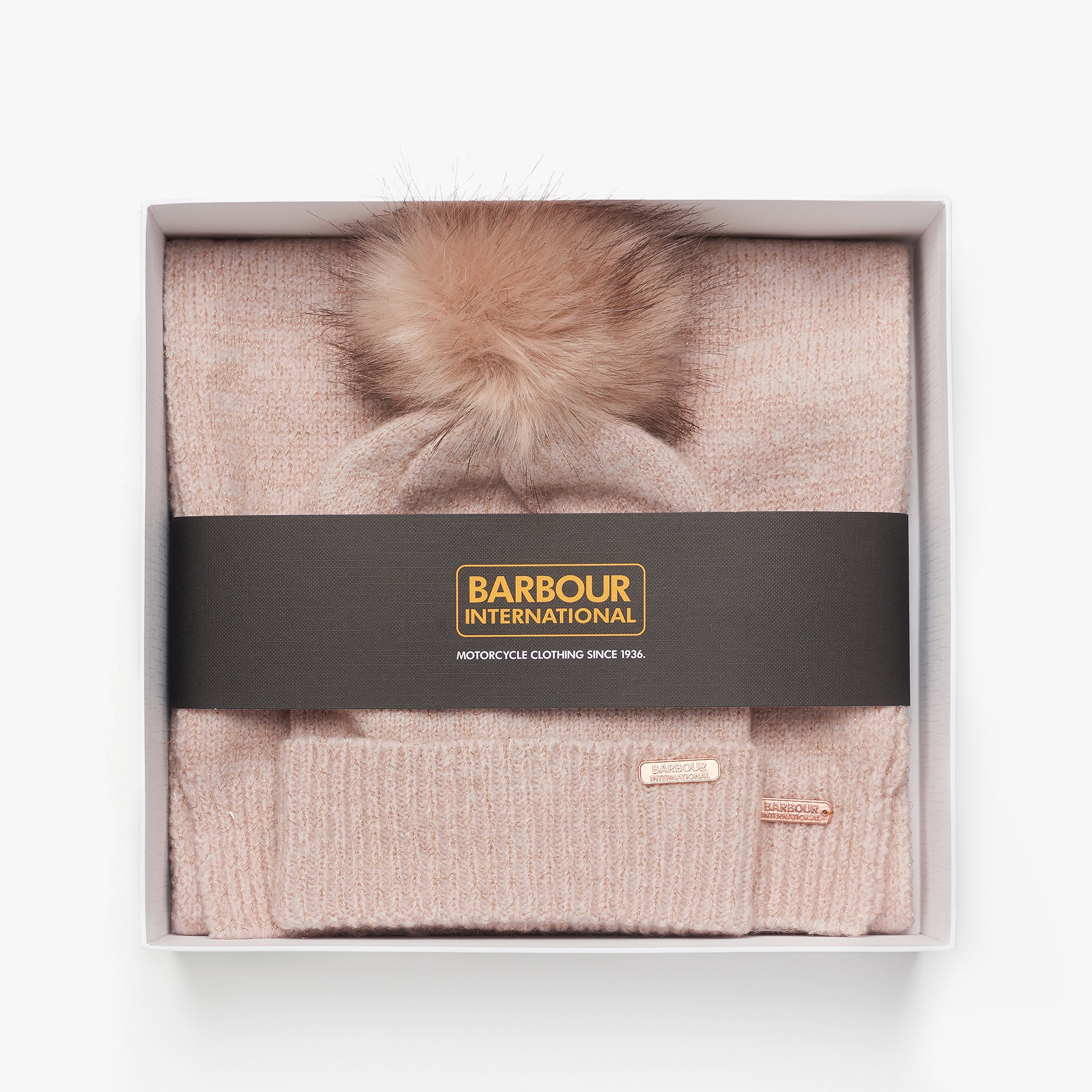 Barbour SPARKLE BEANIE & SCARF Womens Gift Set Pink in gift box front view showcasing beanie and scarf with pom-pom.