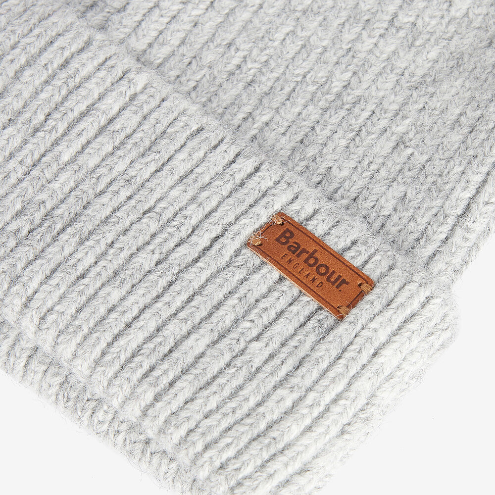 Barbour PENDLE Womens Beanie Light Grey top detail view showcasing knitted texture and branded badge.