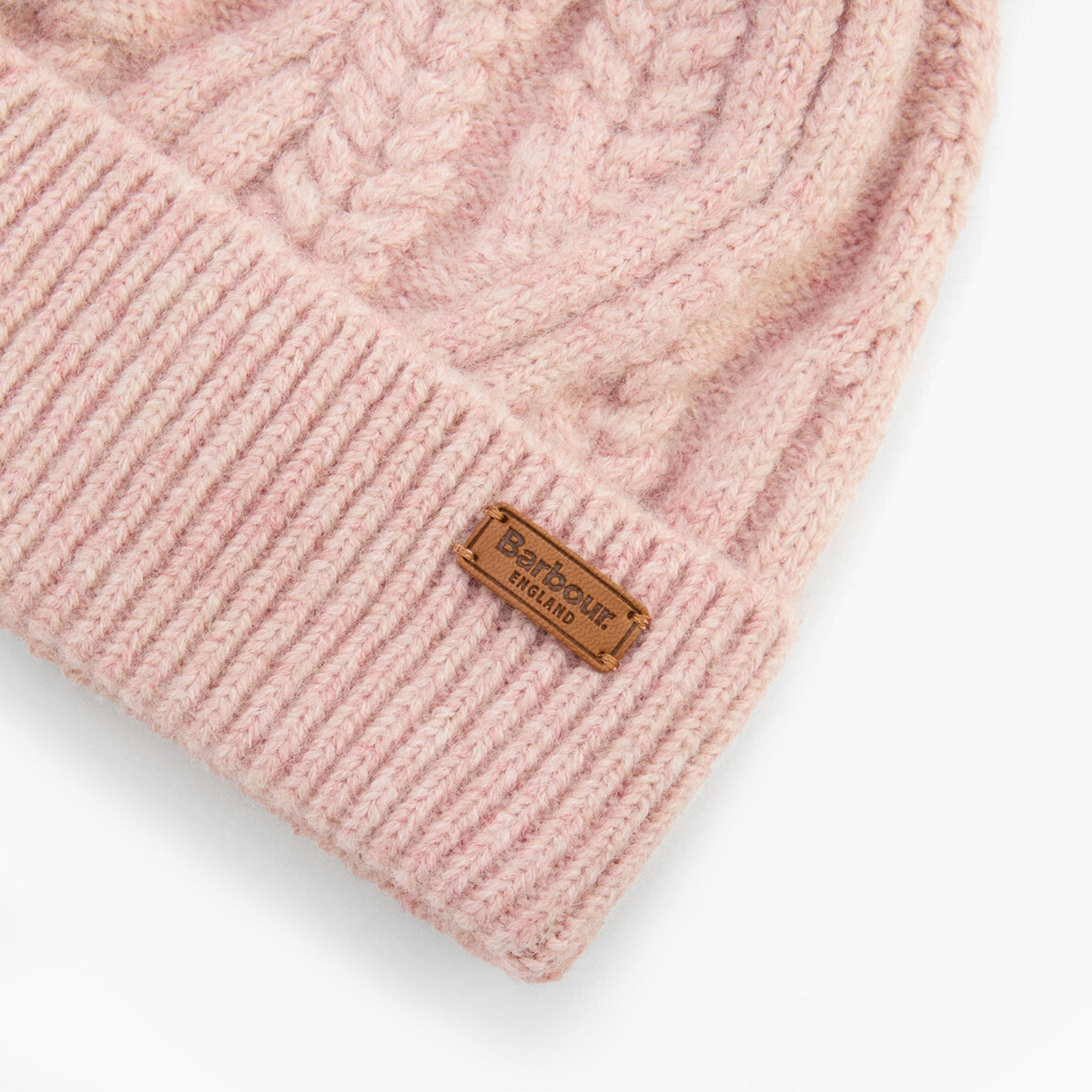 Barbour ELSDON Womens Beanie Gardenia detail view showcasing the soft pink knitted texture and logo label.
