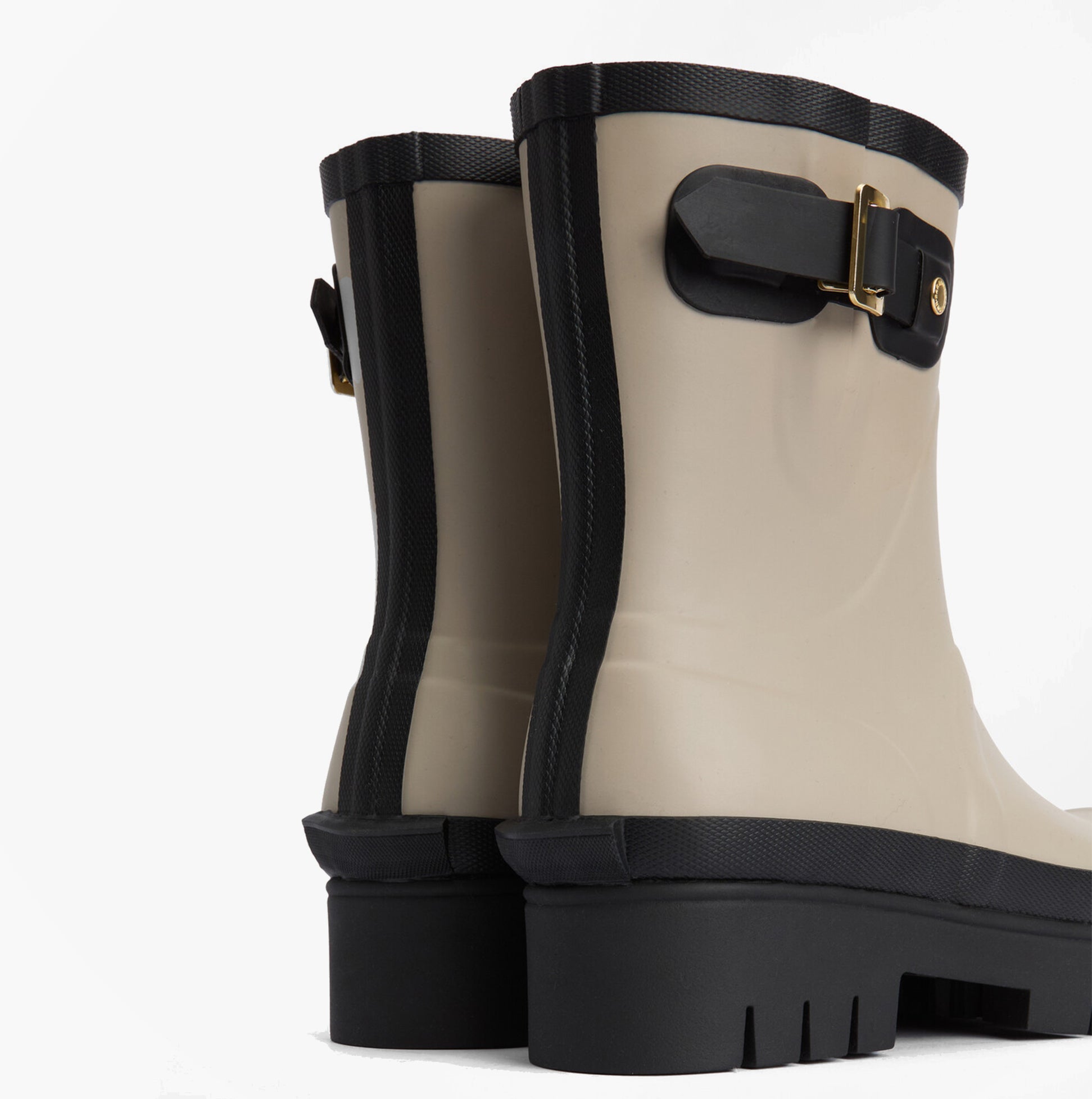 Barbour RAELYNN Womens Wellies Light Sand/Black back view, showcasing rubber upper and block heel design.