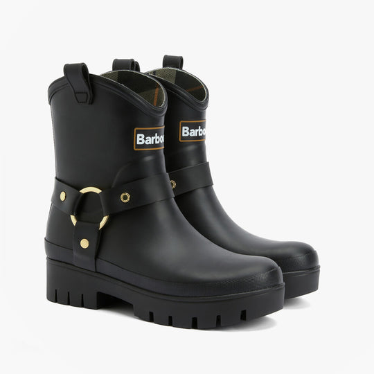 Barbour ELLEY Womens Wellies Black side view showcasing rubber ankle boots with gold buckle detail.