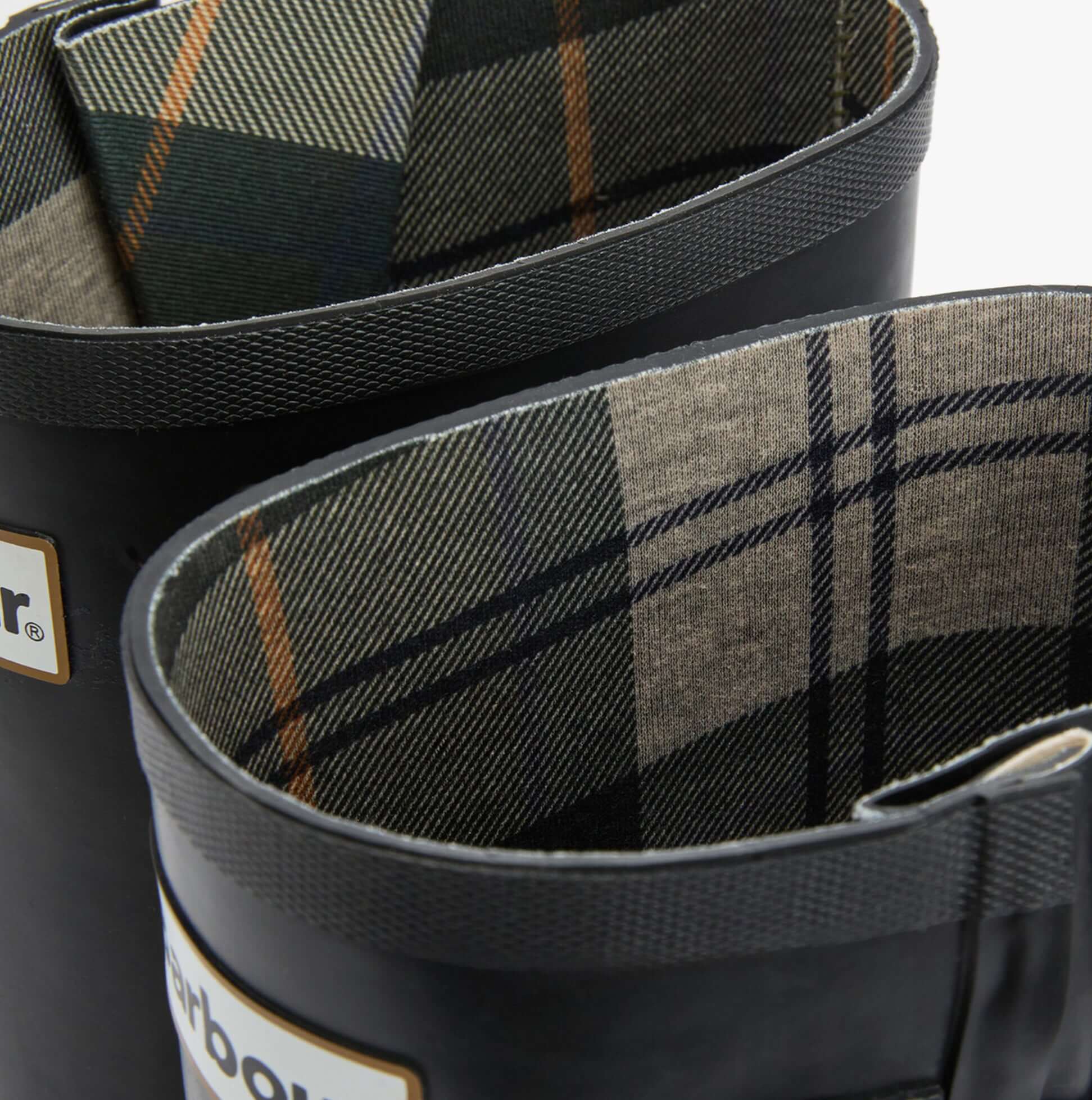 Barbour LEIGHTON Womens Tall Wellies Black interior view showcasing tartan lining and rubber material.