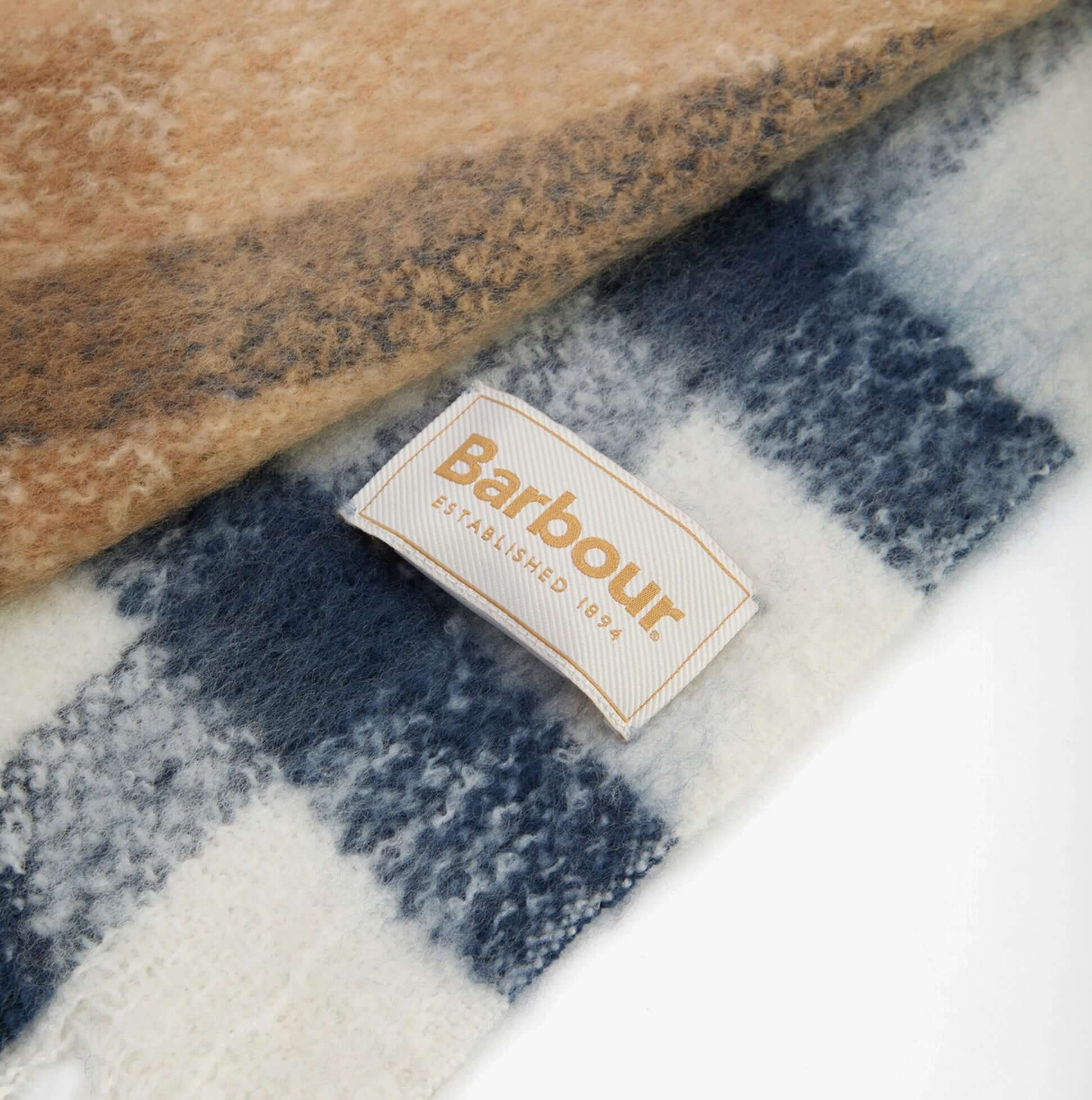 Barbour ISLA TARTAN BOUCLE Womens Winter Hessian Tartan detail view of the scarf label and tartan pattern.
