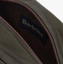 Barbour WAXED Mens Washbag Olive/Beacon interior detail view showing brand label and zip closure.