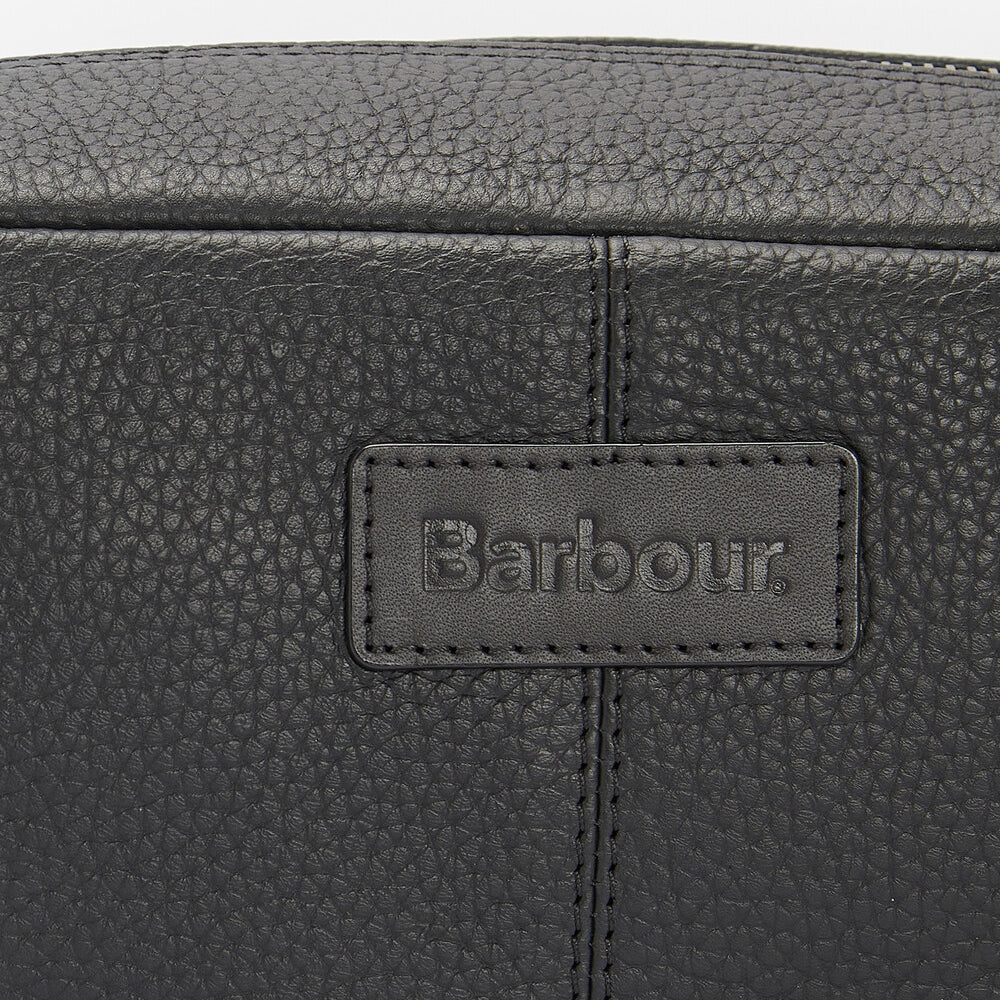 Barbour HIGHGATE LEATHER Mens Wash Bag Black detail view of leather texture and logo